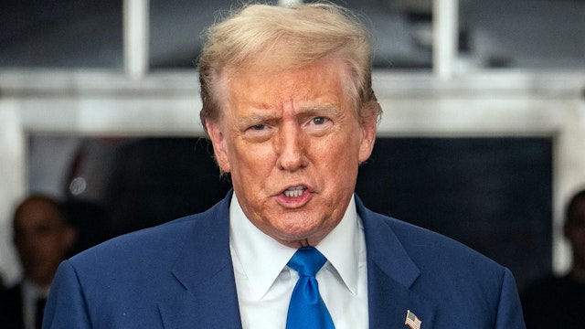 Former US President and Republican presidential candidate Donald Trump talks to reporters at the ends of today's proceedings in his criminal trial at the New York State Supreme Court in New York City, on May 3, 2024. Trump, 77, is accused of falsifying business records to reimburse his lawyer, Michael Cohen, for a $130,000 hush money payment made to porn star Stormy Daniels just days ahead of the 2016 election against Hillary Clinton.