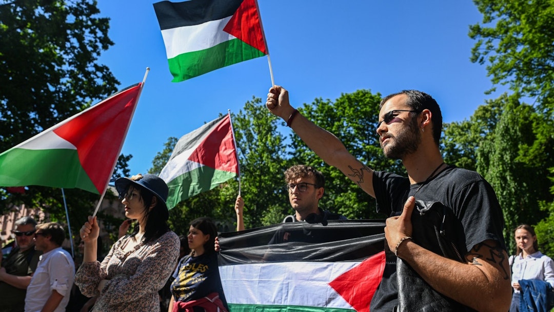 KRAKOW, POLAND - MAY 15: University students organize a pro-Palestinian demonstration with Palestinian flags and banners and demand that the university rector cut academic ties with Israeli universities in Krakow, Poland on May 15, 2024.