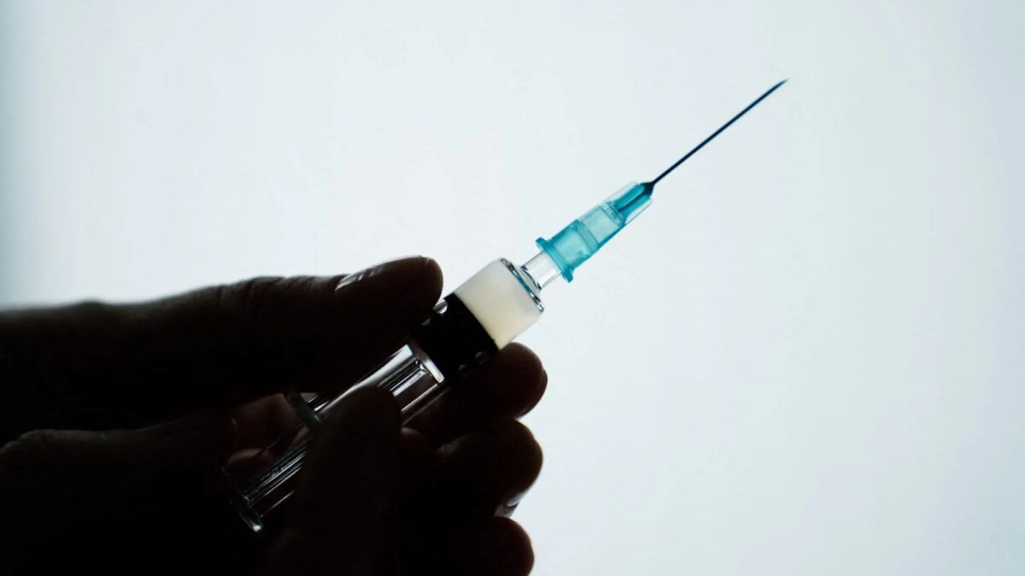 Syringe Illustration photo of a vaccine syringe in hand, shot in Savigny sur Orge, France on April 20th, 2024.