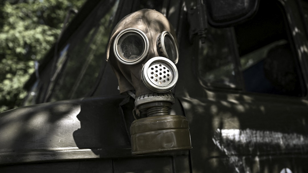 A gas mask is placed on a military vehicle at a check point held by Ukrainian servicemen outside the city of Lysychansk in the eastern Ukranian region of Donbas, on May 23, 2022, amid Russian invasion of Ukraine.