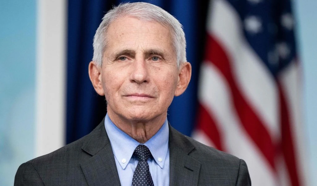 Dr. Anthony Fauci, White House Chief Medical Advisor and Director of the National Institute of Allergy and Infectious Diseases, attends an event with First Lady Jill Biden to urge Americans to get vaccinated ahead of the holiday season, during a COVID-19 virtual event with AARP in the Eisenhower Executive Office Building in Washington, DC, December 9, 2022. (Photo by SAUL LOEB/AFP via Getty Images)