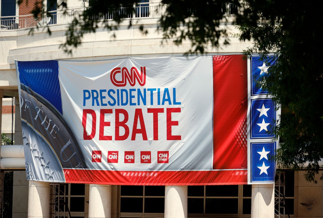 ATLANTA, GEORGIA - JUNE 26: Signage for a CNN presidential debate is seen outside of their studios at the Turner Entertainment Networks on June 26, 2024 in Atlanta, Georgia. U.S. President Joe Biden and Republican presidential candidate, former U.S. President Donald Trump will face off in the first presidential debate of the 2024 presidential cycle this Thursday. (Photo by Kevin Dietsch/Getty Images)