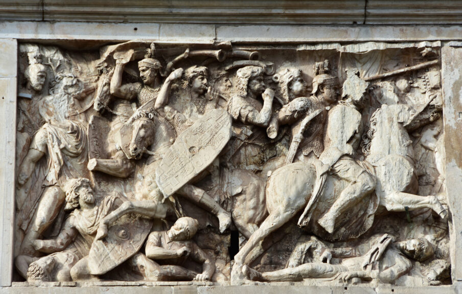 Chrysophotolux.  Getty Images.  Relief panel with a battle scene between Roman cavalry and Dacian barbarians from the beautiful Arch of Constantine in the center of Rome.