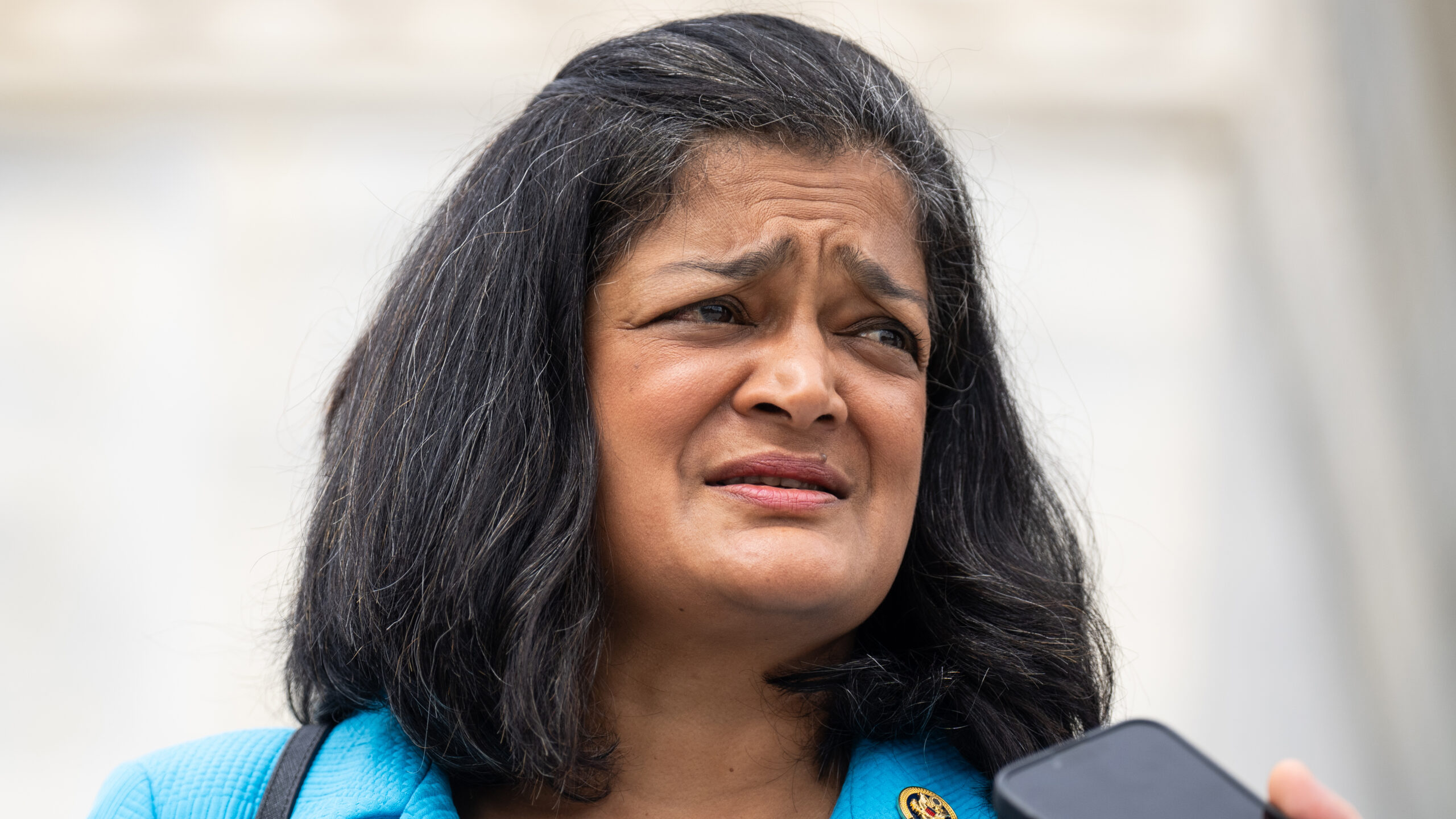 Democrat Pramila Jayapal laughs during discussion of headline about undocumented immigrant raping minor in NYC