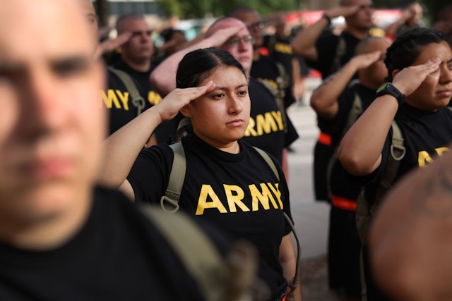 COLUMBIA, SOUTH CAROLINA - SEPTEMBER 28: U.S. Army trainees participating in the Army's new Future Soldier Prep Course stand in formation following a physical training session at Fort Jackson on September 28, 2022 in Columbia, South Carolina. The course is a pre-basic training improvement camp for those wanting to join the Army but who have not yet qualified due to excess body fat or low academic test scores. If the soldier hopefuls improve enough to meet the Army's standards, they sign an enlistment contract and are transferred into the basic training program. The Army started the program after it was faced with a shortage of qualified recruits enlisting in the service. Even with the high success rate of the prep course, the Army expects to miss its 2022 recruiting goals by 10,000 soldiers. (Photo by Scott Olson/Getty Images)