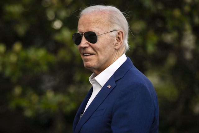 US President Joe Biden walks on the South Lawn of the White House after arriving on Marine One in Washington, DC, US, on Sunday, July 7, 2024. Biden will face another tough audience this coming week when he hosts NATO leaders at a summit in Washington, with foreign leaders and diplomats being among some of the most vocal in expressing concern over his age and health. Photographer: Samuel Corum/Sipa/Bloomberg via Getty Images