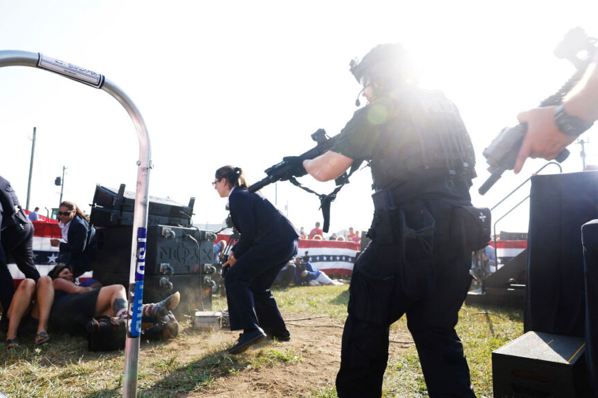 BUTLER, PENNSYLVANIA - JULY 13: Law enforcement react after shots were fire at republican presidential candidate former President Donald Trump's rally on July 13, 2024 in Butler, Pennsylvania. 