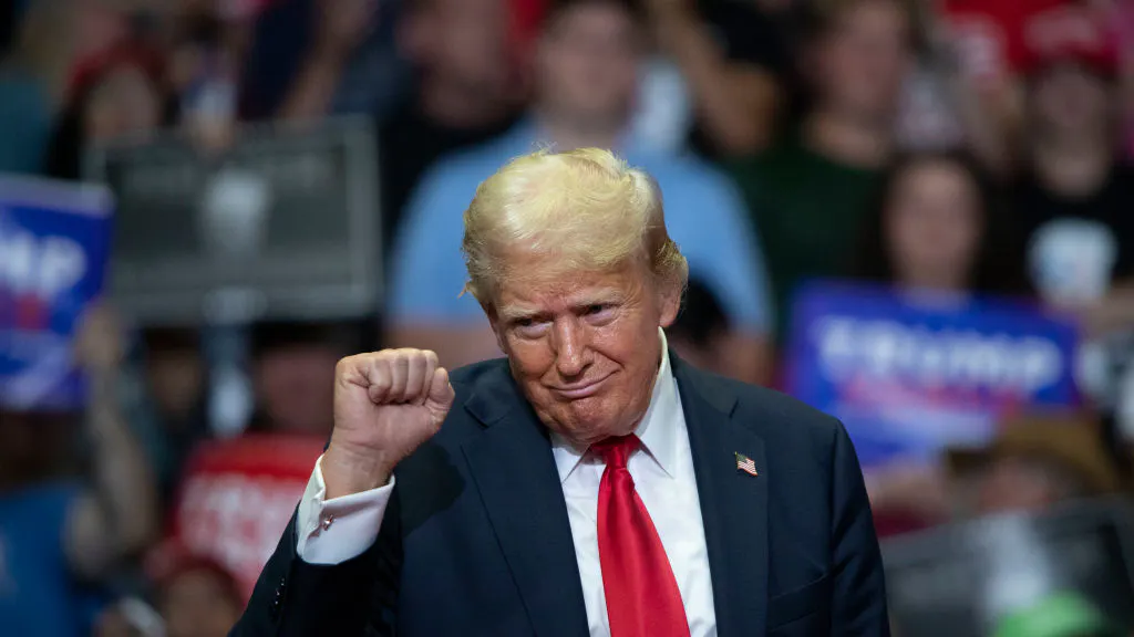 Trump Takes A Break During Michigan Rally To Mock His Own Combover