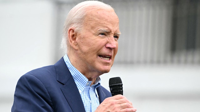 US President Joe Biden speaks during a barbeque for active-duty military families in honor of the Fourth of July on the South Lawn of the White House in Washington, DC, July 4, 2024.