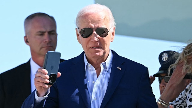 US President Joe Biden and First Lady Jill Biden step off Air Force One upon arrival at John F. Kennedy International Airport in New York, New York on June 28, 2024.