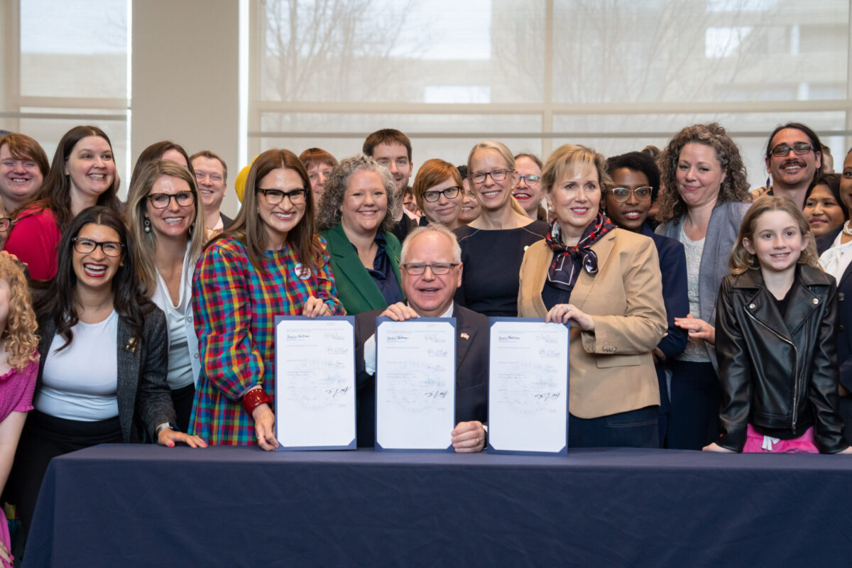 Walz Signed Exec Order Protecting Trans Procedures On Minors While Holding Hand Of Gender-Confused 12-Year-Old