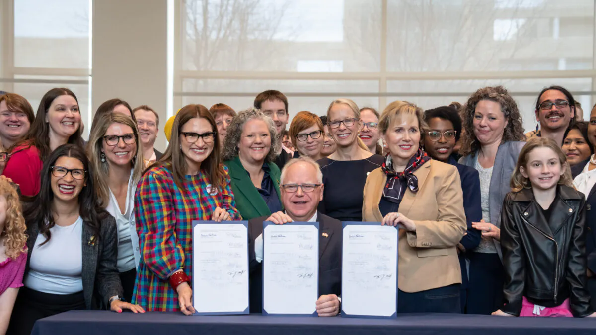 Walz Signed Exec Order Protecting Trans Procedures On Minors While Holding Hand Of Gender-Confused 12-Year-Old