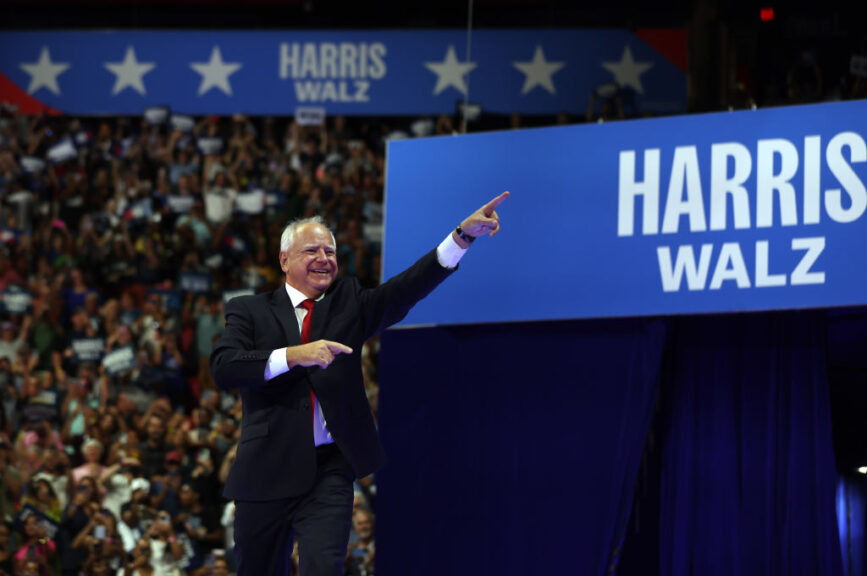 LAS VEGAS, NEVADA - AUGUST 10: Democratic vice presidential candidate Minnesota Governor Tim Walz greets supporter during a campaign rally with his running mate, Democratic presidential candidate, U.S. Vice President Kamala Harris, at the University of Las Vegas Thomas & Mack Center on August 10, 2024 in Las Vegas, Nevada. Kamala Harris and her newly selected running mate Tim Walz are campaigning across the country this week. (Photo by Justin Sullivan/Getty Images)