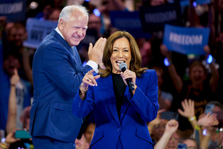 US Vice President Kamala Harris and Tim Walz, governor of Minnesota and Democratic vice-presidential nominee, during a campaign event at Fiserv Forum in Milwaukee, Wisconsin, US, on Tuesday, Aug. 20, 2024. In the days following her rapid ascent to the top of the Democratic ticket, Harris quickly brought in a coterie of advisers from former President Barack Obama's White House and campaign efforts to join her team. Photographer: Bing Guan/Bloomberg via Getty Images