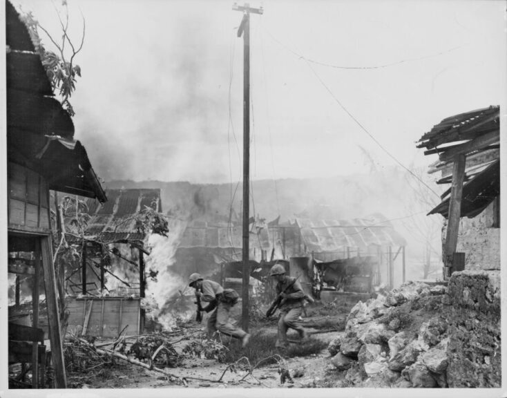 US Marines moving positions during battle in Garapan, during the Pacific Campaign of World War Two, Saipan, circa 1943-1945. (Photo by US Marine Corps/Getty Images)