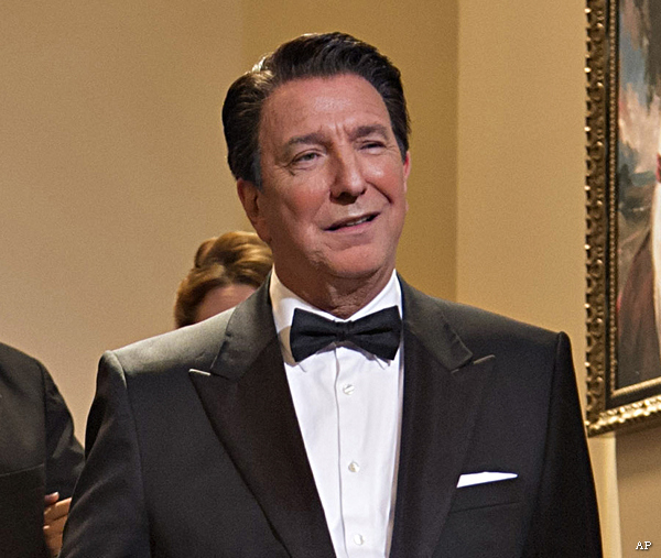 This film image released by The Weinstein Company shows Jane Fonda as Nancy Reagan, center left, and Alan Rickman as Ronald Reagan in a scene from 