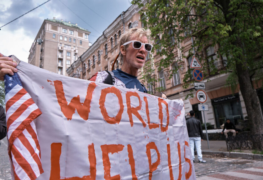 A man holds banner and shouts slogans during a demonstration in support of Mariupol defenders on May 3, 2022 in Kyiv, Ukraine.