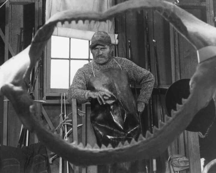 English actor Robert Shaw (1927 - 1978) as Quint, viewed through a set of shark jaws, in a publicity still for 'Jaws', directed by Steven Spielberg, 1975. (Photo by Silver Screen Collection/Getty Images)