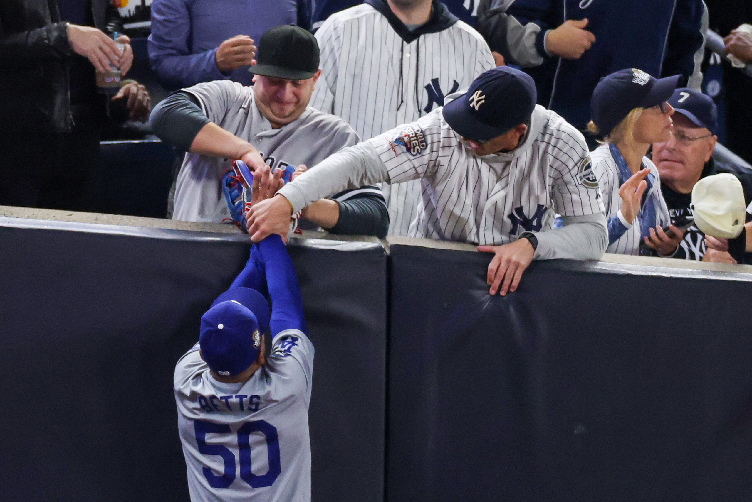 WATCH: Yankees Fans Pry Ball From Mookie Betts’ Glove During Game 4 Of World Series