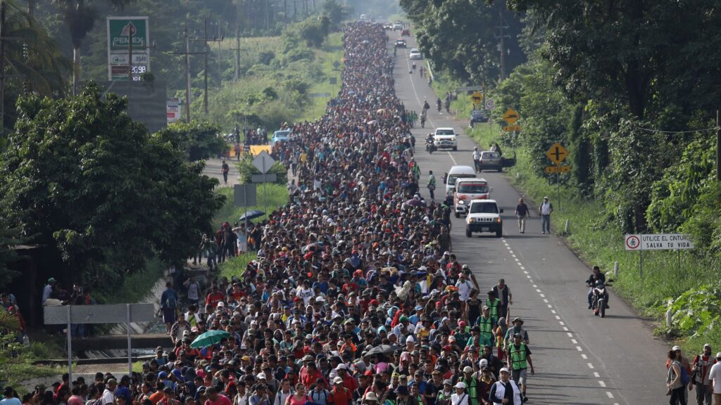 A migrant caravan walks into the interior of Mexico after crossing the Guatemalan border on October 21, 2018 near Ciudad Hidalgo, Mexico The caravan of Central Americans plans to eventually reach the United States.