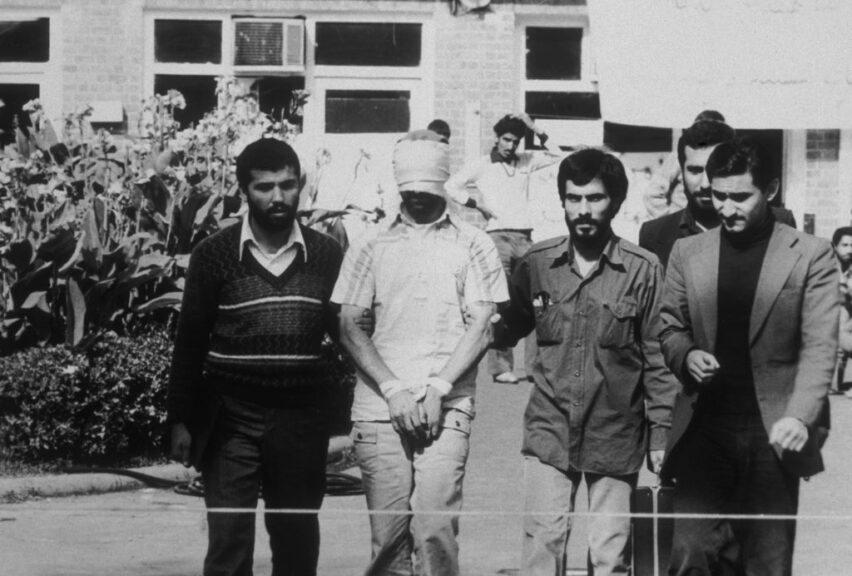 An American hostage being paraded before the cameras by his Iranian captors. Following the Iranian revolution over fifty American hostages were taken and only released after four hundred and forty-four days. (Photo by MPI/Getty Images)