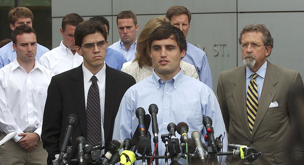 DURHAM, NC - MAY 15: Duke lacrosse player David Evans (C), 23-years-old, proclaims his innocence as he addresses the media outside the Durham County Detention Center after being indicted on sexual assault charges on May 15, 2006 in Durham, North Carolina. Evans is the third player to be indicted for sexual assault of a woman hired as a private dancer to a party attended by lacrosse team members March 13. (Photo by Sara D. Davis/Getty Images)