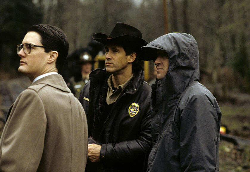 TWIN PEAKS - Pilot - "Northwest Passage" - Airdate: April 8, 1990. (Photo by ABC Photo Archives/Disney General Entertainment Content via Getty Images)PRODUCTION SHOT OF KYLE MACLACHLAN, MICHAEL ONTKEAN AND DAVID LYNCH