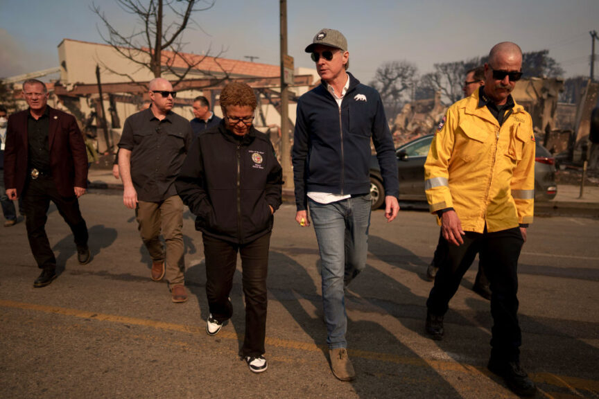 LOS ANGELES, CALIFORNIA - JANUARY 8: California Governor Gavin Newsom and Los Angeles Mayor Karen Bass tour the downtown business district of Pacific Palisades as the Palisades Fire continues to burn on January 8, 2025 in Los Angeles, California. Fueled by intense Santa Ana Winds, the Palisades Fire has grown to over 2,900 acres and 30,000 people have been ordered to evacuate while a second major fire continues to burn near Eaton Canyon in Altadena.