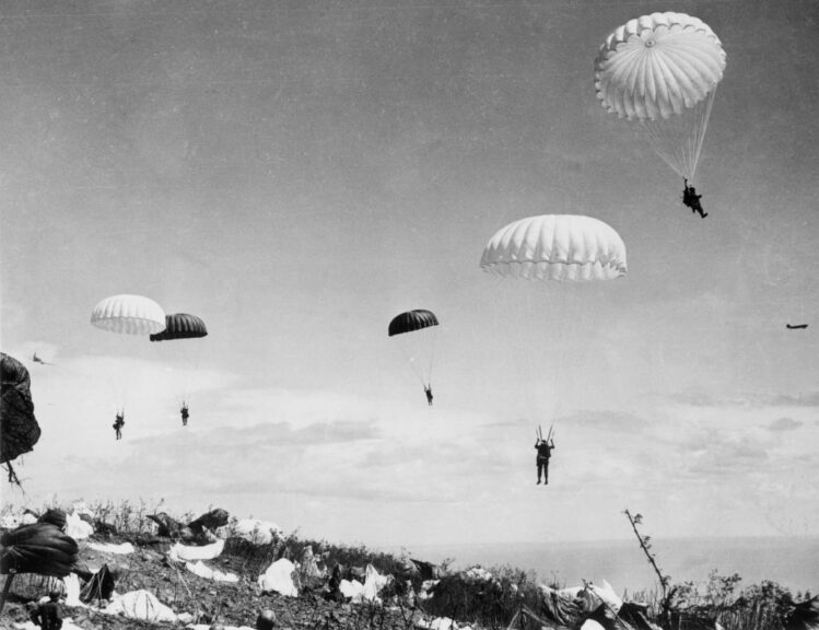 16th February 1945: American paratroops of the 503rd Regiment (Parachute Regiment) drop on the bomb-shattered terrain of the island of Corregidor in the Philippines. The air warriors quickly seized batteries and defences, clearing the entrance to Manila Bay and opening the harbour to the Allied fleet. (Photo by Central Press/Hulton Archive/Getty Images)