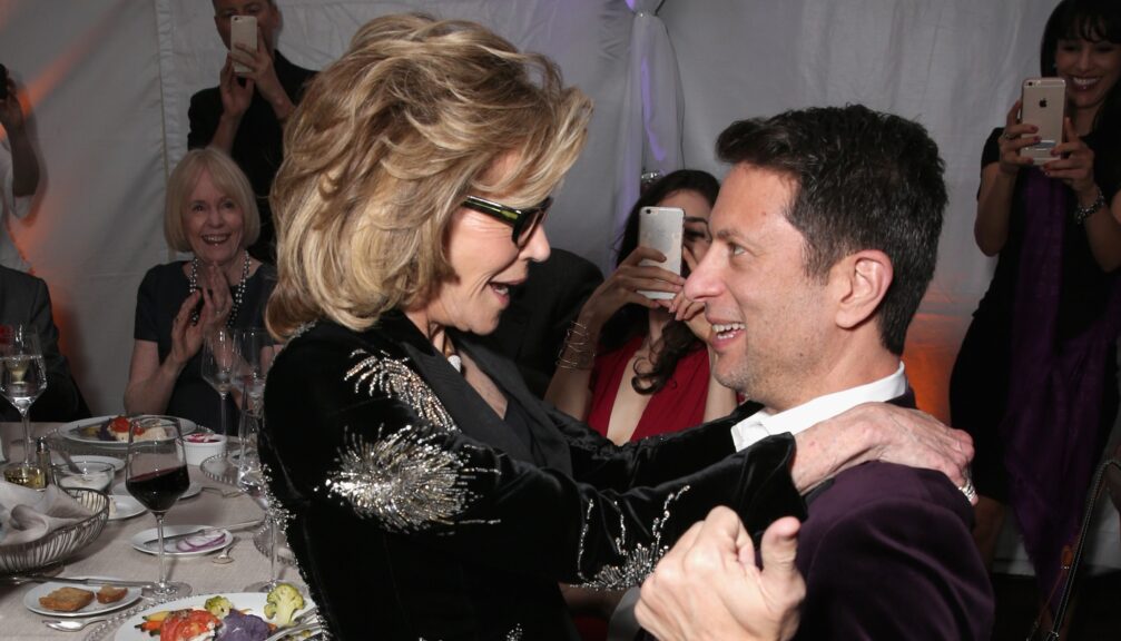 Actress and activist Jane Fonda embraces Ibrahim AlHusseini at a Champions of our Planet's Future gala in 2016 in Beverly Hills. (Photo by Michael Buckner/Variety/Penske Media via Getty Images)