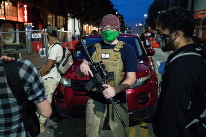 SEATTLE, WA - JUNE 10: A volunteer works security at an entrance to the so-called "Capitol Hill Autonomous Zone" on June 10, 2020 in Seattle, Washington. The zone includes the blocks surrounding the Seattle Police Departments East Precinct, which was the site of violent clashes with Black Lives Matter protesters, who have continued to demonstrate in the wake of George Floyds death. (Photo by David Ryder/Getty Images)