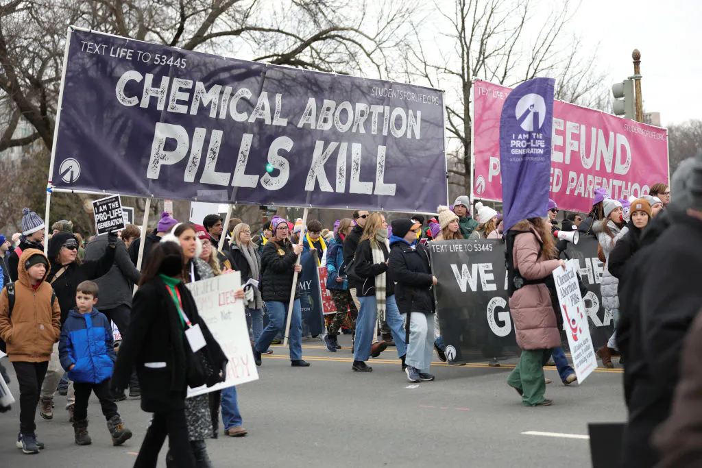 Anti-abortion rights demonstrators march to the Supreme Court for the 52nd annual March For Life in Washington, D.C. on January 24, 2025. (Photo by Bryan Dozier / Middle East Images / Middle East Images via AFP)