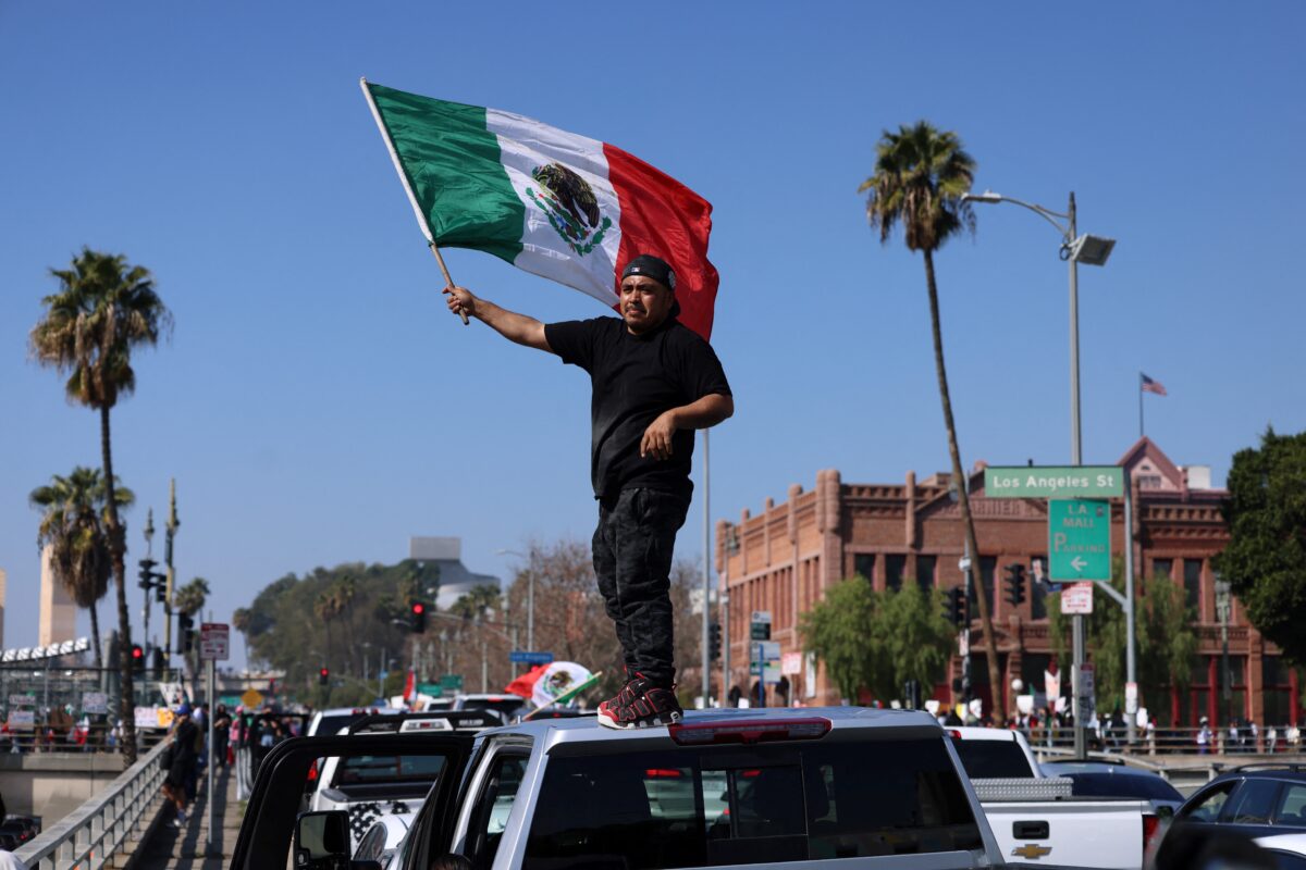 Thousands Block Streets, Wave Foreign Flags Across U.S. To Protest Trump’s Immigration Policies