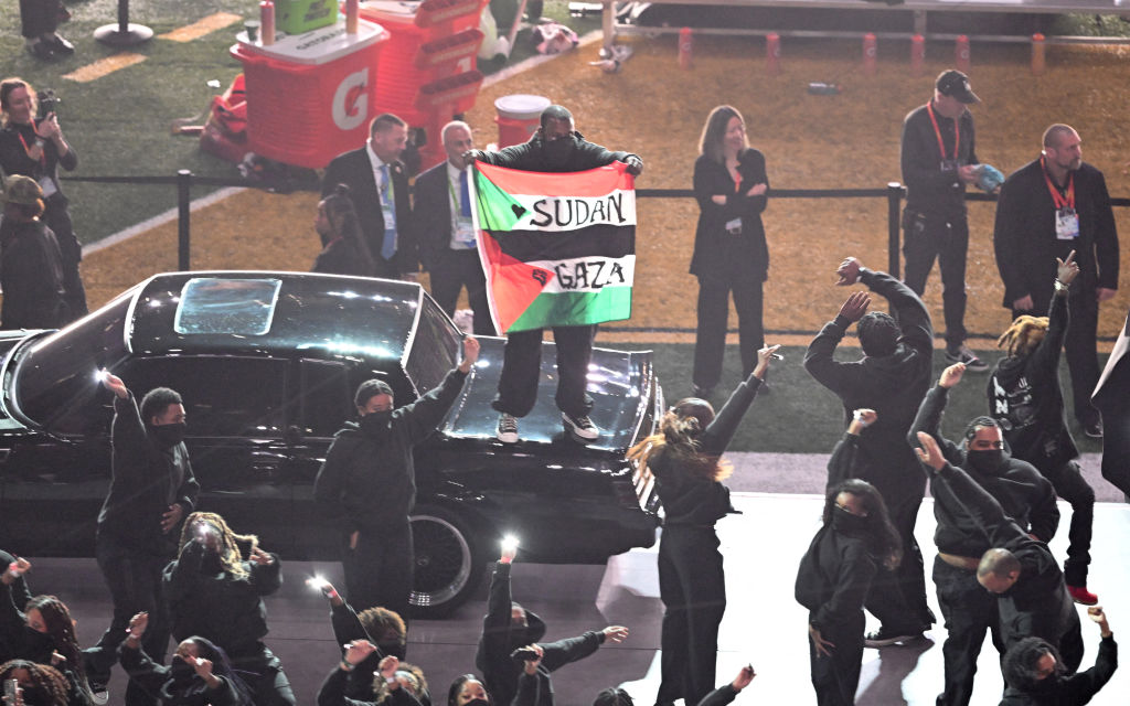 Anti-Israel Protester Ousted After Waving Palestinian Flag During Super Bowl Halftime Show