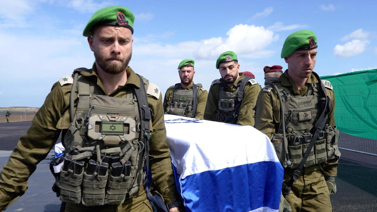 NextImg:Israel Receives Bodies Of Four Hostages After Hamas Parades Them By Cheering Crowds
