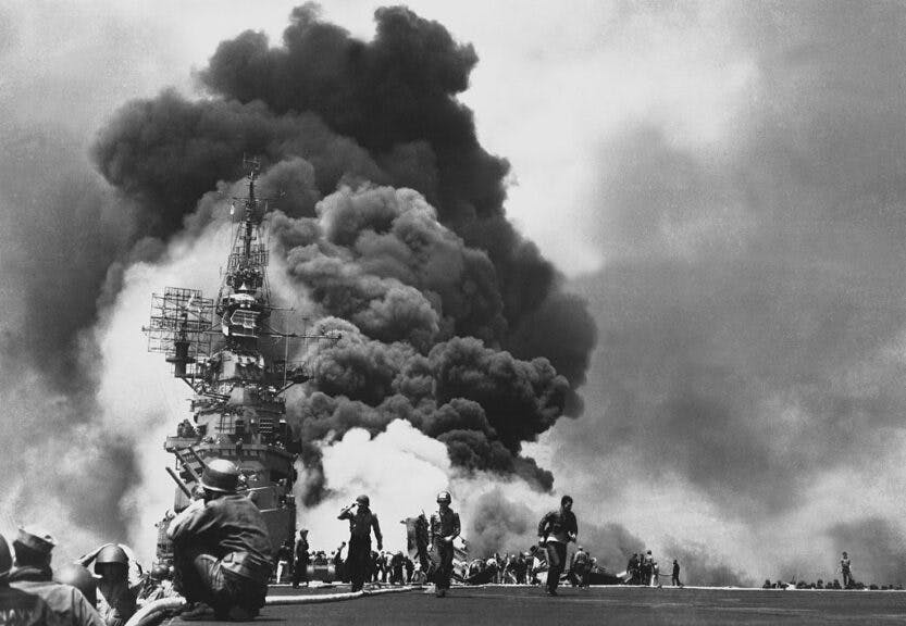 USS Bunker Hill hit by two kamikaze pilots, during the Battle of Okinawa, Japan 1945. (Photo by Universal History Archive/Universal Images Group via Getty Images)