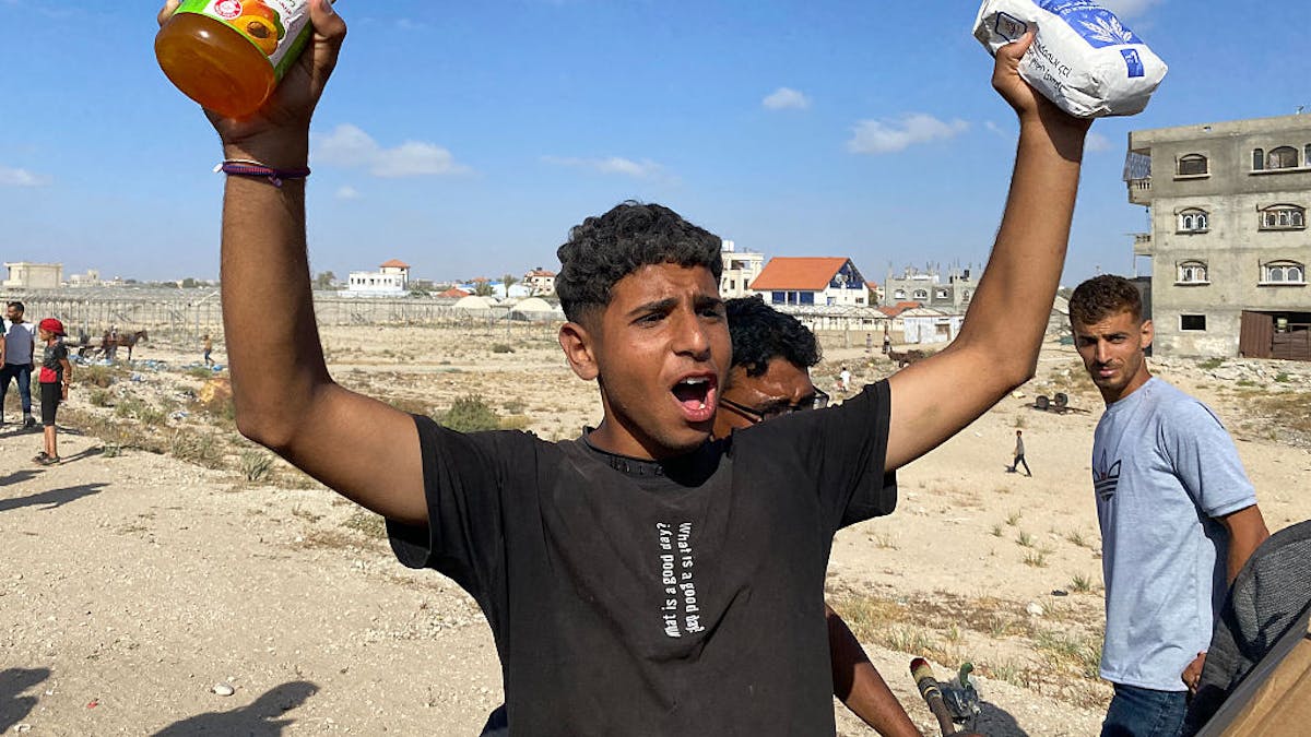 NextImg:WATCH: U.S.-Backed Gaza Aid Centers See Chaos, ‘Thank You America’ Cheers, And 500K Meals On Day One