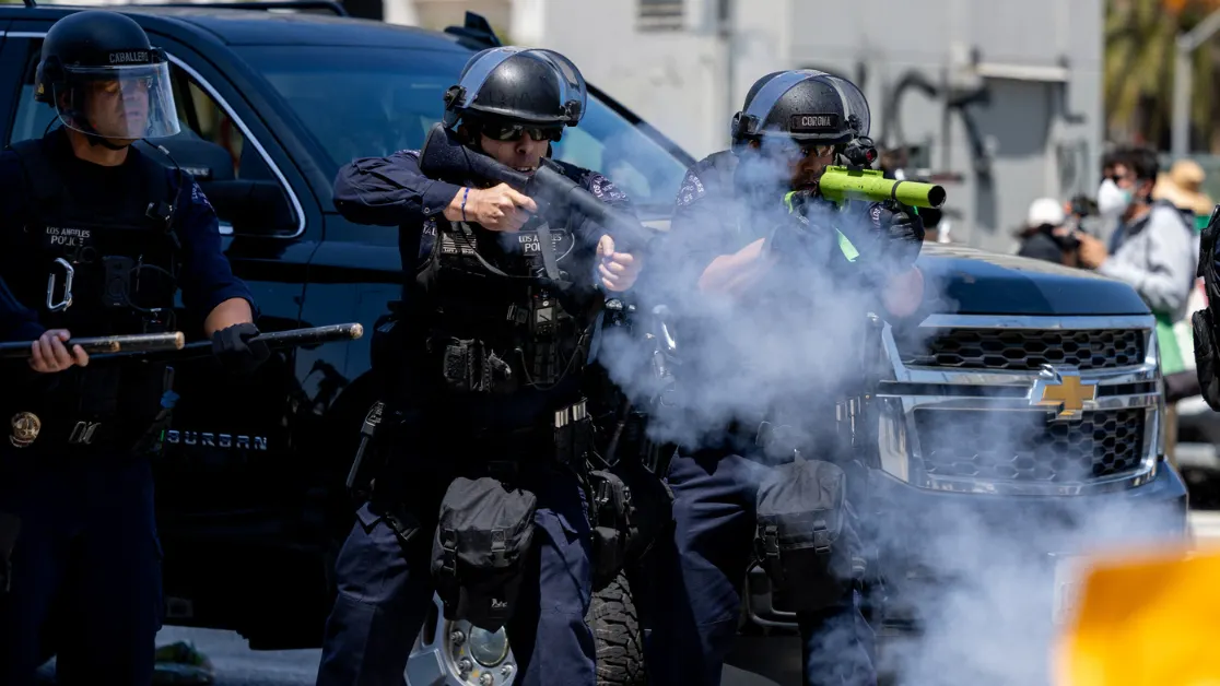 WATCH: Reporter Caught In L.A. Riot Crossfire, Hit By Non-Lethal Round During Live Shot
