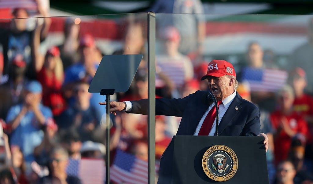 ‘Don’t Worry, It’s Only Fireworks – I Hope’: Trump Laughs Off Pops At Iowa Rally