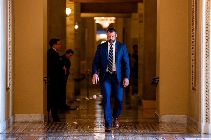 Senator Markwayne Mullin, a Republican from Oklahoma, bounces a ball after leaving the office of Senate Majority Leader John Thune, a Republican from South Dakota, at the US Capitol in Washington, DC, US, on Tuesday, June 3, 2025. President Donald Trump worked the phones Monday and took to social media to try to sway Republican holdouts on his multi-trillion dollar tax bill, encountering conflicting demands from GOP senators even as he urged them to move swiftly. Photographer: Eric Lee/Bloomberg via Getty Images
