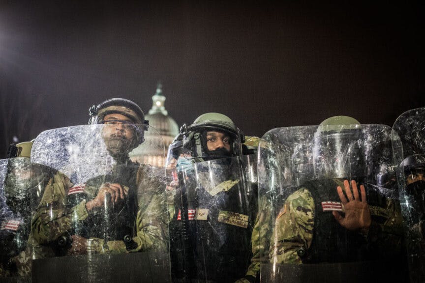 National Guard near the U.S. Capitol on January 06, 2021 in Washington, DC. The protesters stormed the historic building, breaking windows and clashing with police. Trump supporters had gathered in the nation's capital today to protest the ratification of President-elect Joe Biden's Electoral College victory over President Trump in the 2020 election. (Photo by Shay Horse/NurPhoto via Getty Images)