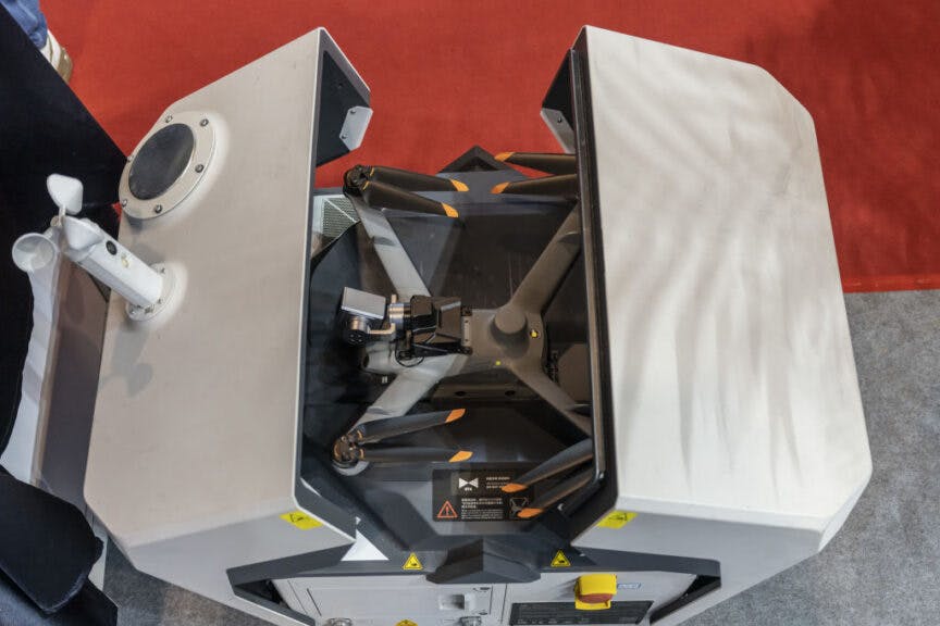 A SZ DJI Technology Co. drone inside the company's Dock 2 on display during the Shanghai International Low-Altitude Economy & UAV System Technology Expo in Shanghai, China, on Thursday, Nov. 28, 2024. The expo runs through Nov. 30. Photographer: Qilai Shen/Bloomberg via Getty Images