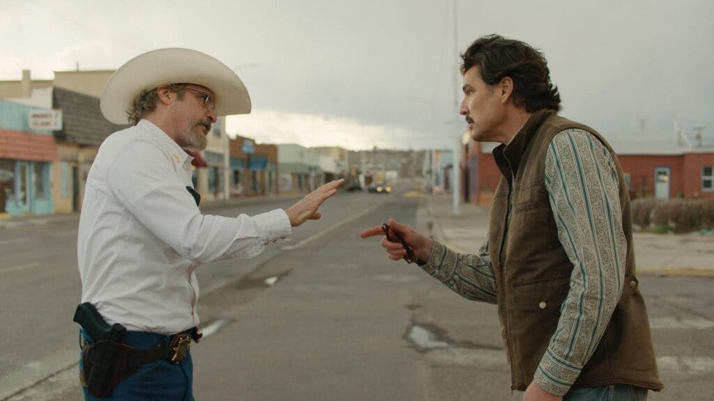 Joaquin Phoenix and Pedro Pascal in “Eddington” (2025) A24. Square Peg Productions. 828 Productions. IMDB.