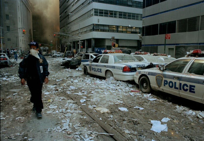 NEW YORK, NEW YORK - SEPTEMBER 11: The streets of downtown New York are covered in debris after both World Trade Towers collapsed from a terrorist attack on September 11, 2001 in New York City. (Photo by Andrew Lichtenstein/Corbis via Getty Images)