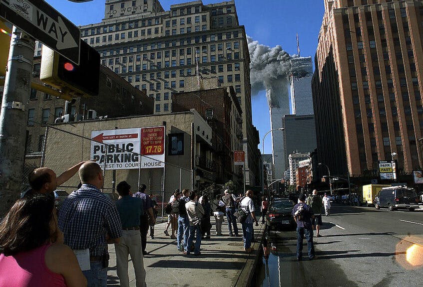NEW YORK CITY - SEPTEMBER 11: (FILE PHOTO) (PUERTO RICO OUT) This is a view from West Broadway Avenue of the downtown Manhattan area of the World Trade Center towers after they were hit by two planes during a terrorist attack September 11, 2001 in New York City. (Jose Jimenez/Primera Hora via Getty Images) ***PUERTO RICO OUT ****