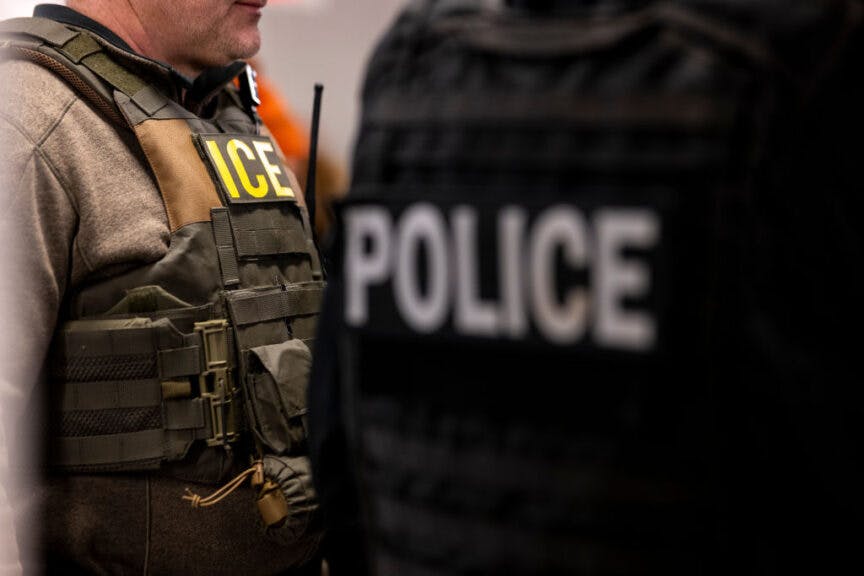 US Immigration and Customs Enforcement (ICE) agents, along with other federal law enforcement agencies, attend a pre-enforcement meeting in Chicago, Illinois, US, on Sunday, Jan. 26, 2025. President Donald Trump has pledged to carry out the largest deportation effort in US history, vowing to ultimately deport all of the foreigners living in the country without permission.