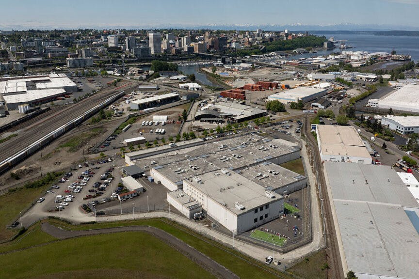TACOMA, WASHINGTON - MAY 2: An aerial view of Detainees exercising in an outdoor recreation area at the Northwest ICE Processing Center on May 2, 2025 in Tacoma, Washington. The number of detainees at the detention center, which is run by GEO Group, increased by nearly 50% in April according to Rep. Emily Randall (D-WA). (Photo by David Ryder/Getty Images)