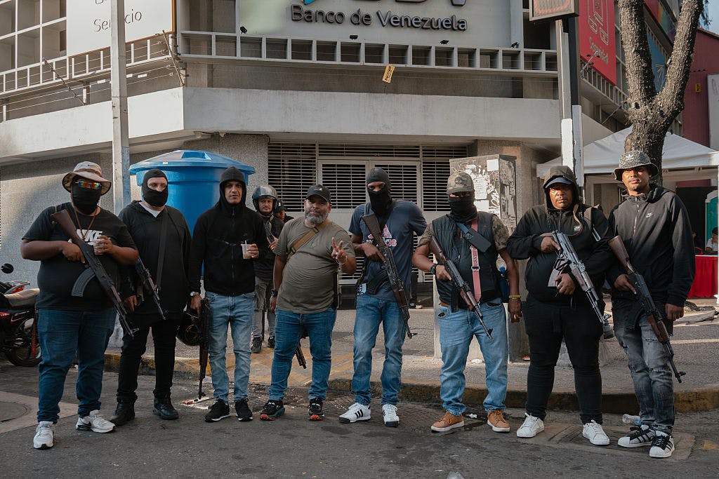 Pro-Maduro Militias Crack Down On Dissent, Search For Supporters Of U.S. Raid