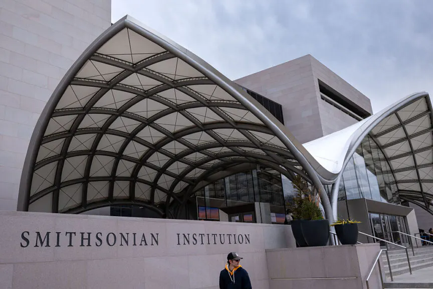 Visitors outside the Smithsonian Institute's National Air and Space Museum in Washington, DC, US, on Friday, Dec. 26, 2025. The White House is raising the pressure on the Smithsonian Institution to turn over extensive internal records as part of a broader effort to assert control over how US history is presented - and threatening to withhold congressionally authorized funding if it doesn't comply by Jan. 13. Photographer: Kent Nishimura/Bloomberg via Getty Images