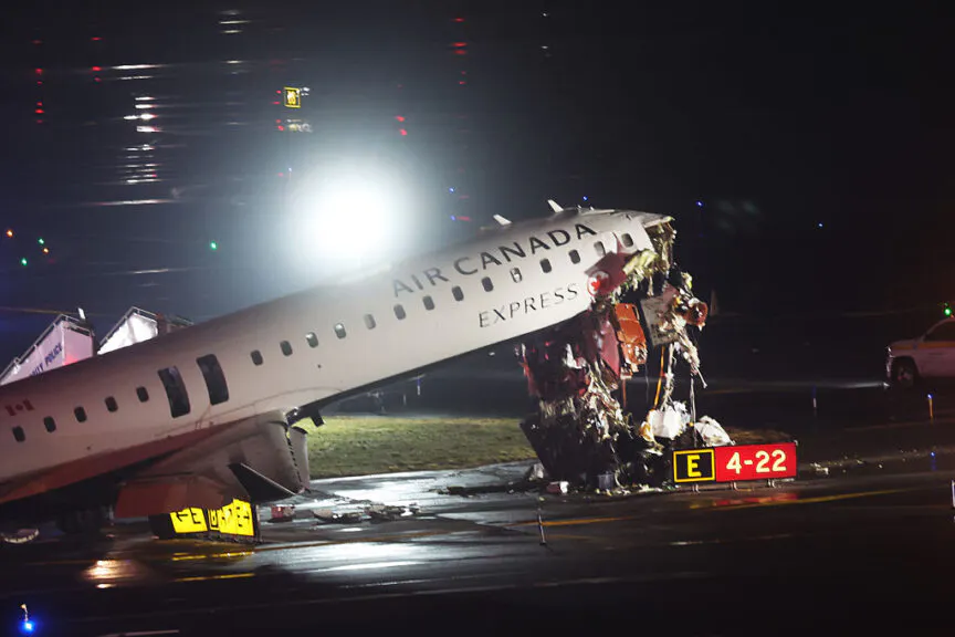 NEW YORK, NEW YORK - MARCH 23: An Air Canada Express plane sits on the tarmac after it collided with a fire truck on the tarmac at LaGuardia Airport on March 23, 2026 in New York City. The plane had landed from a flight from Montreal. (Photo by Spencer Platt/Getty Images)